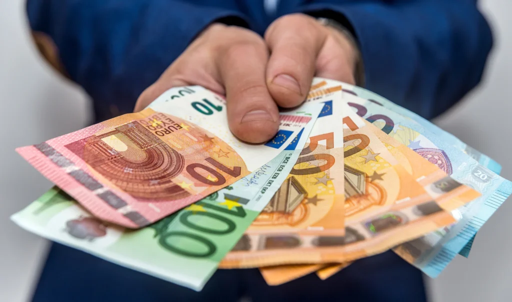 selective focus euro banknotes male hands